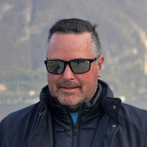 Matthew Cullen, Senior Project Engineer at Spectrum Consultants, wearing sunglasses and a dark jacket outdoors.